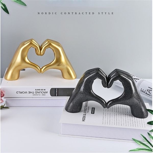 Nordic-inspired resin heart sculpture, abstract hand gesture love figurine for weddings, home decor, or desktop ornament