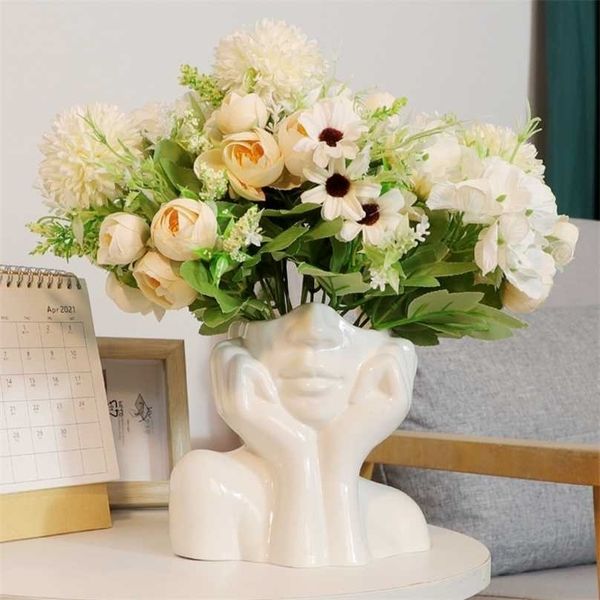 Nordic-style ceramic vase featuring a human body art design with a half-length face sculpture, perfect for cabinet decoration or as a home handicraft ornament
