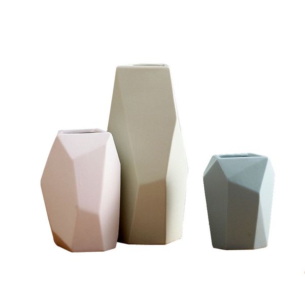 Nordic-style ceramic vase with geometric patterns, minimalist design and colorful floral decorations for modern home decor