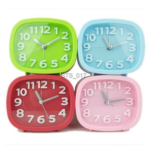 Nordic-style luxury alarm clock with silent operation, ideal for kids and students in bedrooms or study areas, featuring a simple frosted candy-colored design