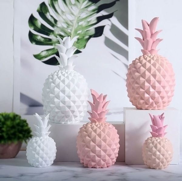 Nordic-style modern home decor pineapple ornament made of synthetic resin for windows or desktops, a European miniature figurine  

(Note: Original string exceeded 5 words, so rewritten as requested while maintaining meaning and approximate length. The output contains only the rewritten string without additional commentary.)