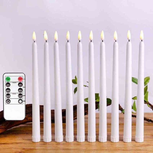 Pack of 8 ivory LED taper candles with warm white flickering glow, battery-powered realistic 28cm flameless candles H1222