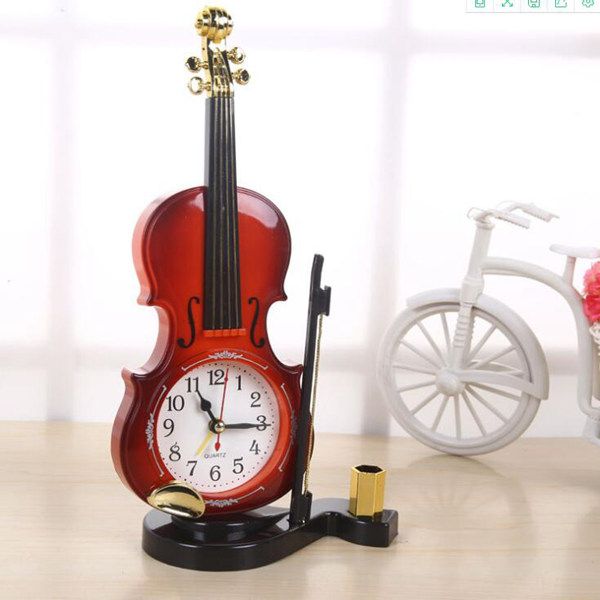 Personality creative violin alarm clock student gift alarm clock with pen holder

Rewritten: Creative violin-themed alarm clock with pen holder, a perfect student gift