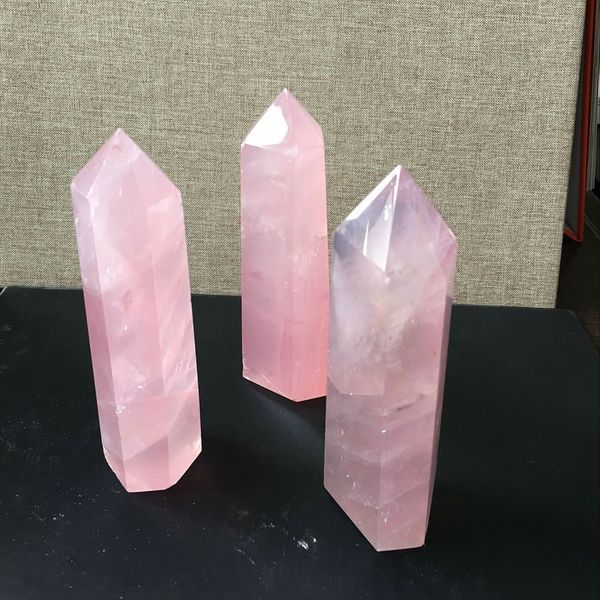 Pink rose quartz crystal wand for healing, meditation, and protection, crafted from natural high-quality mineral stone, ideal for home decor and DIY