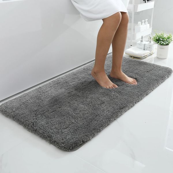 Plush absorbent quick-dry bathroom rug for shower and floor protection in living spaces