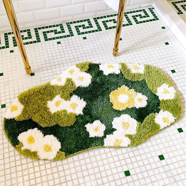 Plush tufted grass-pattern bathroom mat for soft, cozy bedroom or home decor