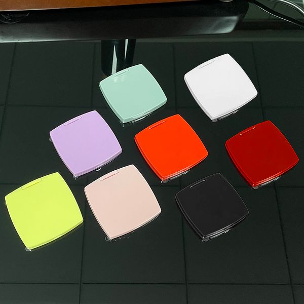 Portable double-sided magnifying makeup mirror with a flannel pouch, ideal for VIP clients