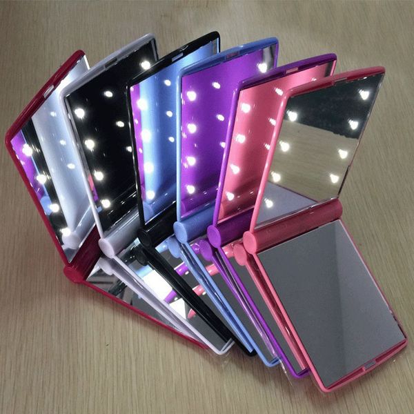 Portable folding LED makeup mirror with 8 lights for travel and cosmetic use