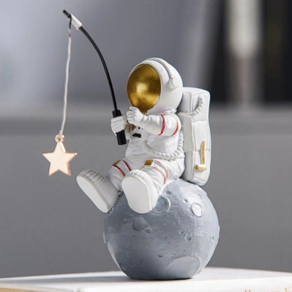 Resin astronaut figurine for home decor, a stylish spaceman sculpture perfect for living room or desktop display