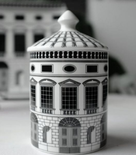 Retro-style candle holder with castle plate design featuring white and black geometric lines for home decor