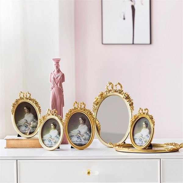 Retro-style golden mirror bow frame for modern home wall decor and girl's room furnishing
