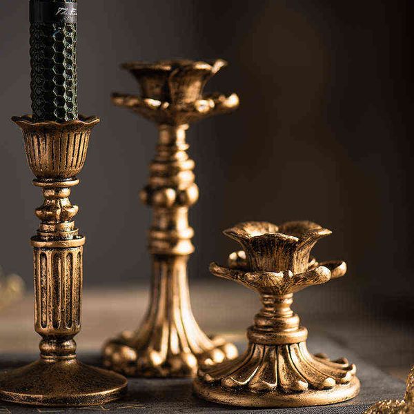 Retro-style resin candle holder sconce with antique French design, perfect for home decor and photography props