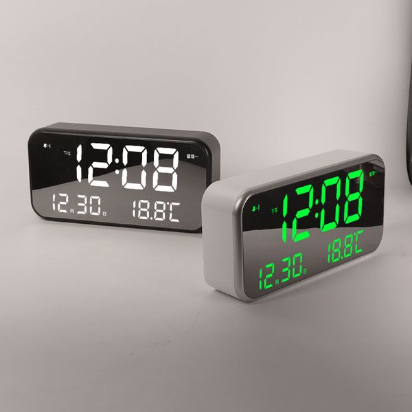 Sleek digital LED mirror clock with alarm, snooze, music, and temperature display for stylish wake-up light