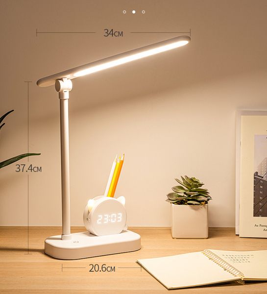 Table lamp with pen holder, desk clock, and eye protection for student dormitories, featuring large capacity and top lighting