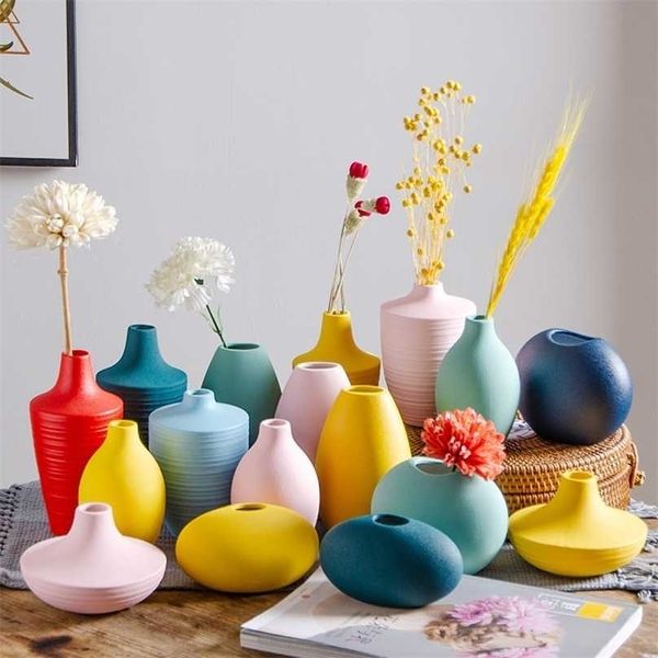 The Nordic Small Vase is a simple modern ceramic ornament for floral decoration in living rooms, porches, or on TV cabinets