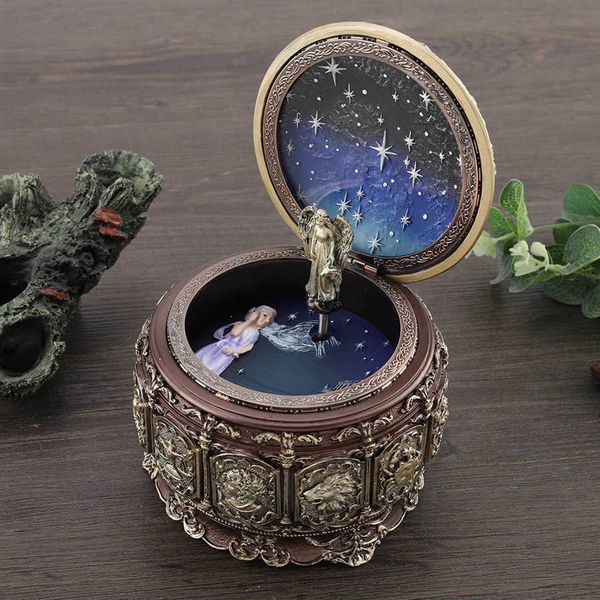 Vintage music box featuring 12 rotating constellations with twinkling LED lights, perfect for weddings and Valentine's decor