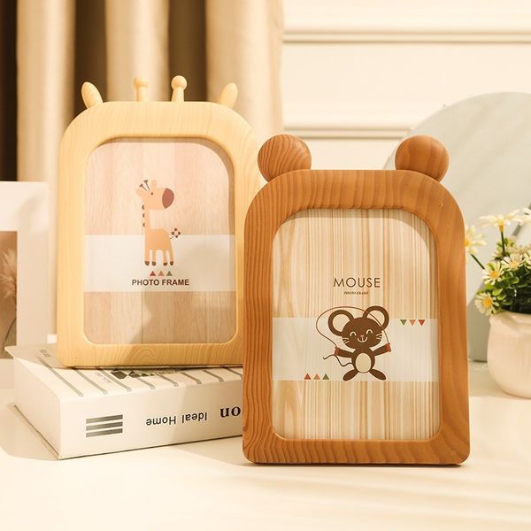 Vintage wooden picture frames for kids' room decor, featuring retro cartoon designs as charming gift options