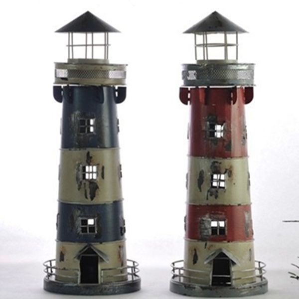 Vintage wrought iron lighthouse-inspired candle holders for nostalgic Mediterranean-style home decor