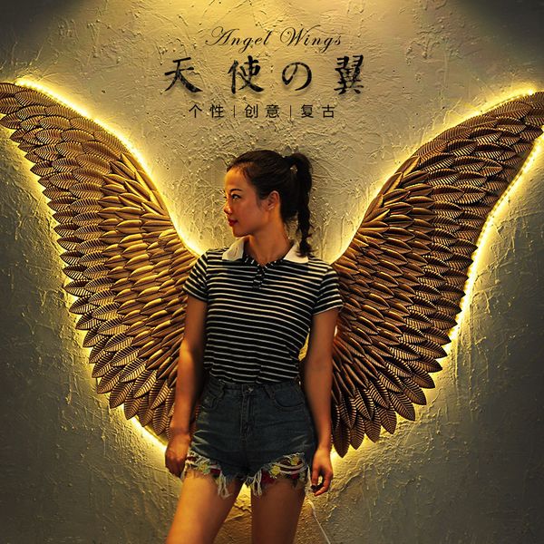 Vintage-style LED angel wing wall decor for bars, cafes, and homes