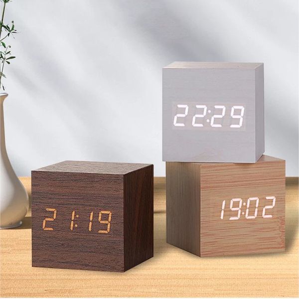 Voice-activated LED smart clock with snooze, thermometer, and USB/AAA power options