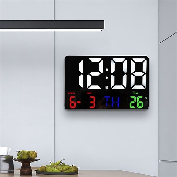 Wall-mounted LED digital clock with large display showing temperature, date, and day, featuring remote control for living room decor