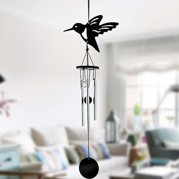Wind chimes featuring a modern metal hummingbird design, creating soothing melodies for farmhouse-style decoration
