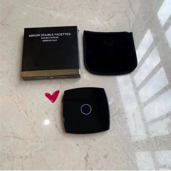Women's stylish compact folding mirrors in black, featuring smooth double-sided design for convenient travel makeup
