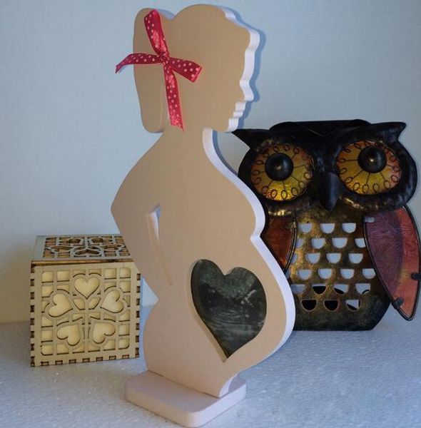 Wooden frames for maternity and home decor, crafted from wood, ideal for weddings and ornamental use