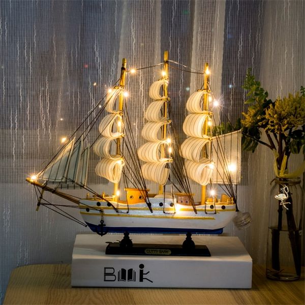 Wooden sailboat decor for Mediterranean-style homes, a creative room accessory and birthday gift idea